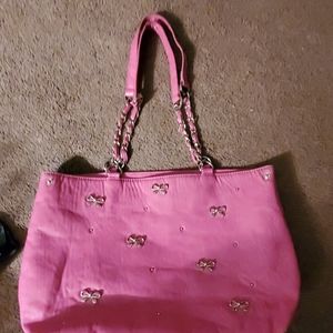 Pink tote bag with gold chain handles
